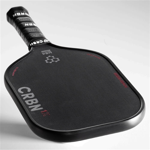 CRBN-1X Power Series Pickleball Paddle featuring a sleek dark grey and black design. Medium sized grip with circumference measuring 4.25 inches