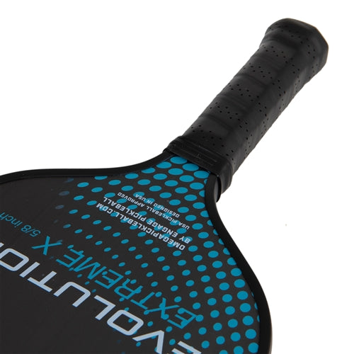 The Omega Evolution Extreme X  Paddle by Engage Pickleball  features the Extreme X name on the front, and solid black background accented by a gradient pattern of dots. Elongated 16.5" shape, in 13mm or 16mm core thickness options.