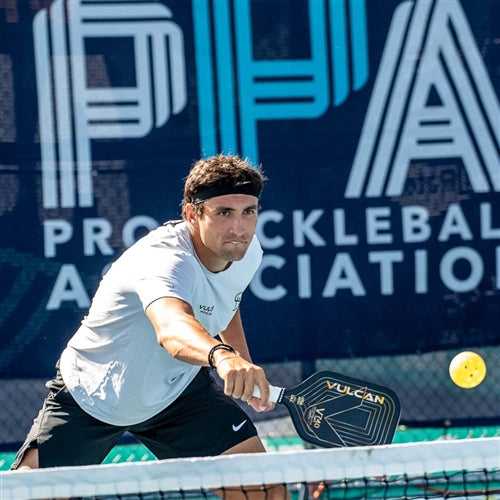The V740 MAX Pickleball Paddle by Vulcan has a carbon-fiberglass face with StateraCore poly honeycomb core and an extended handle in stylish black and gold design.